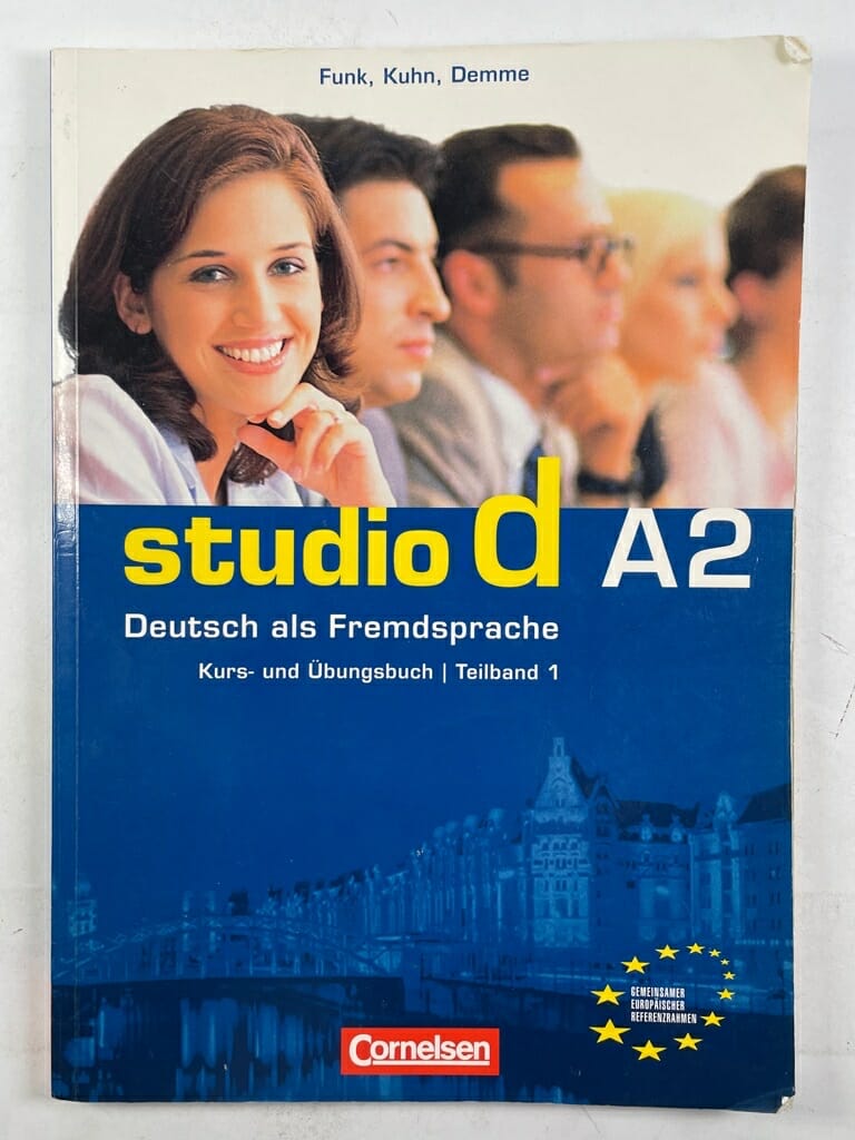 Levně Studio D A2 Teilband 1 Kurs- und Übungsbuch mit Audio-CD