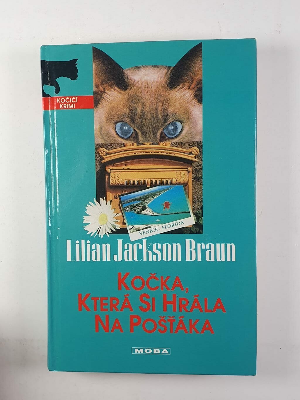 Kočka, která si hrála na pošťáka