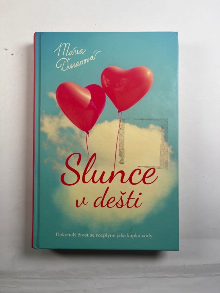 Levně Slunce v dešti