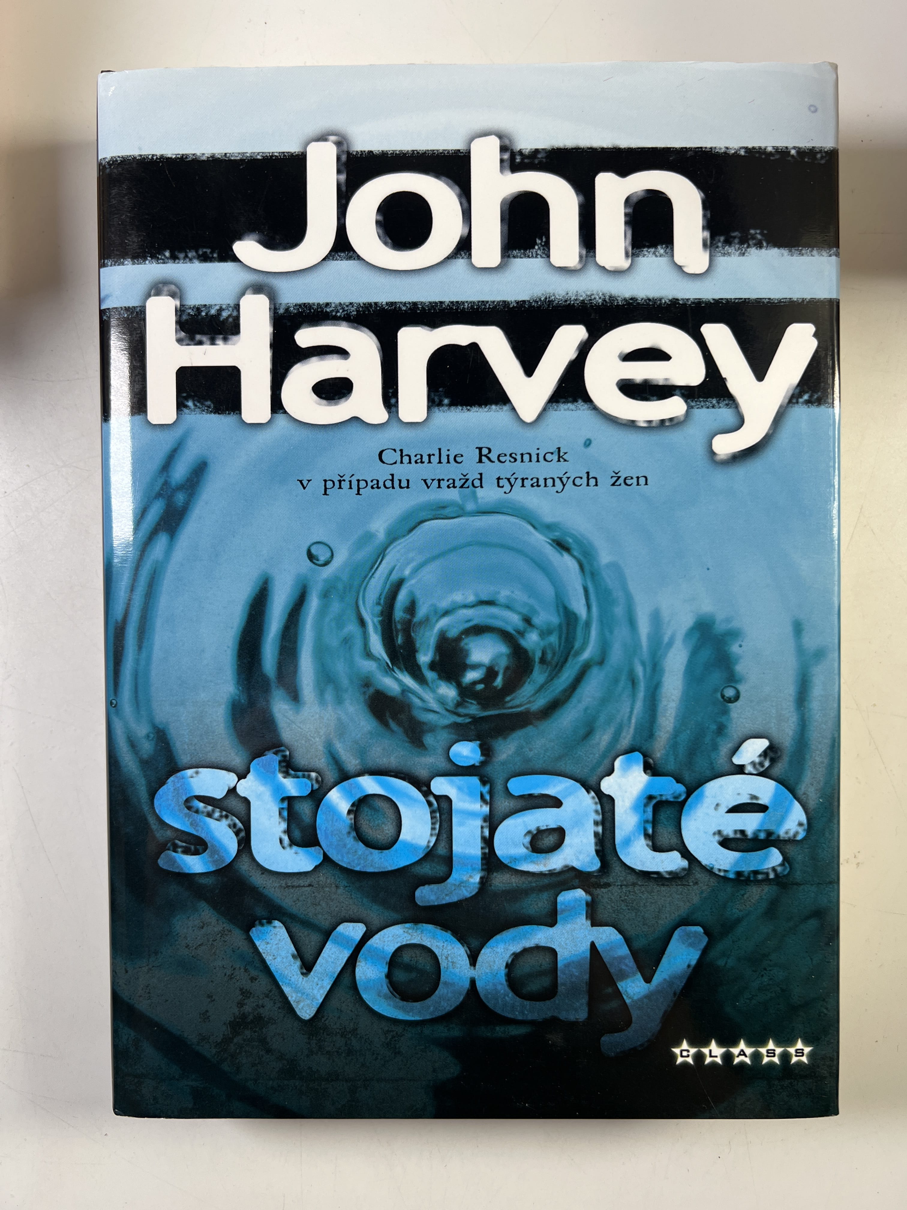 Levně Charlie Resnick: Stojaté vody (9) Pevná (2006)