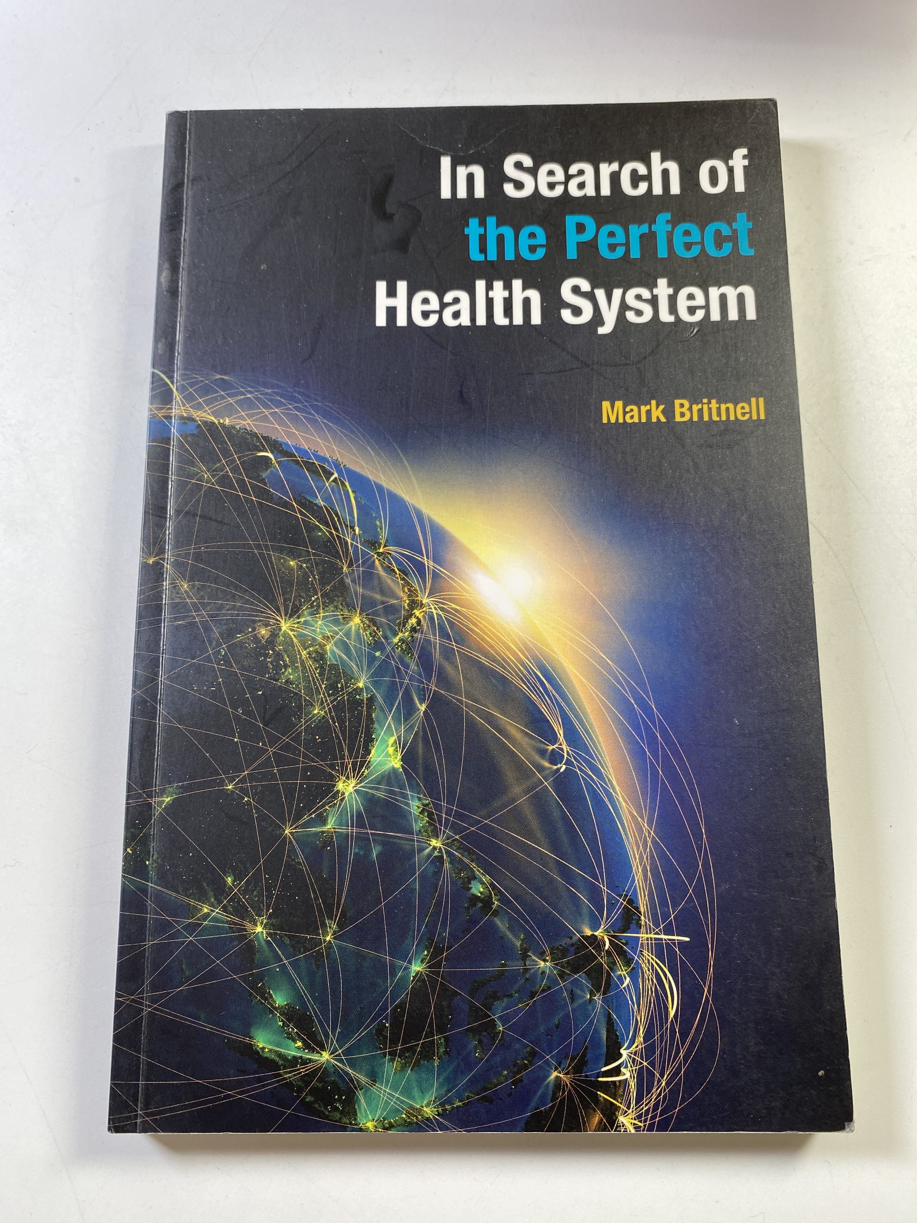 Levně In Search of the Perfect Health System
