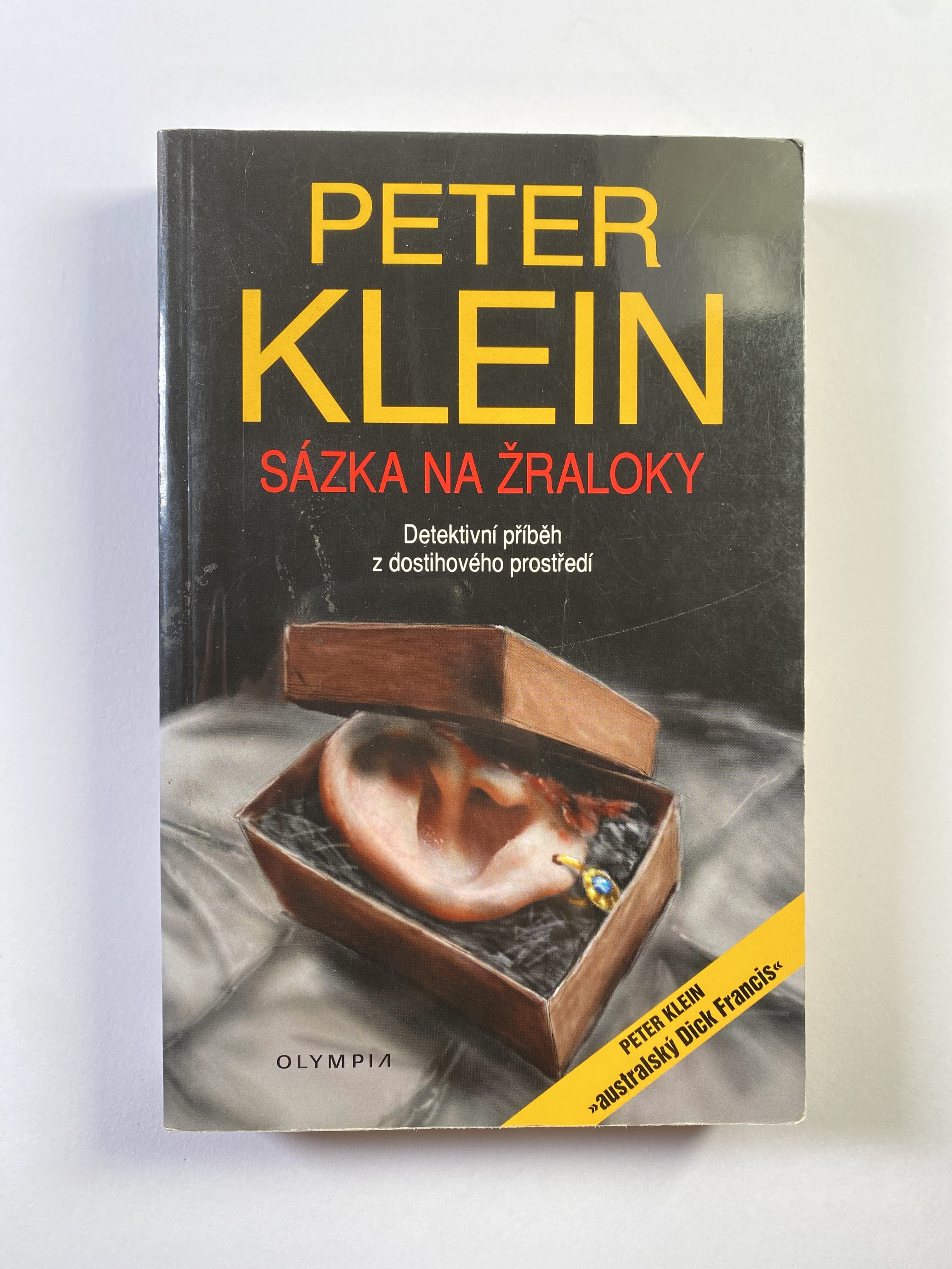 Levně Sázka na žraloky: detektivní příběh z dostihového prostředí