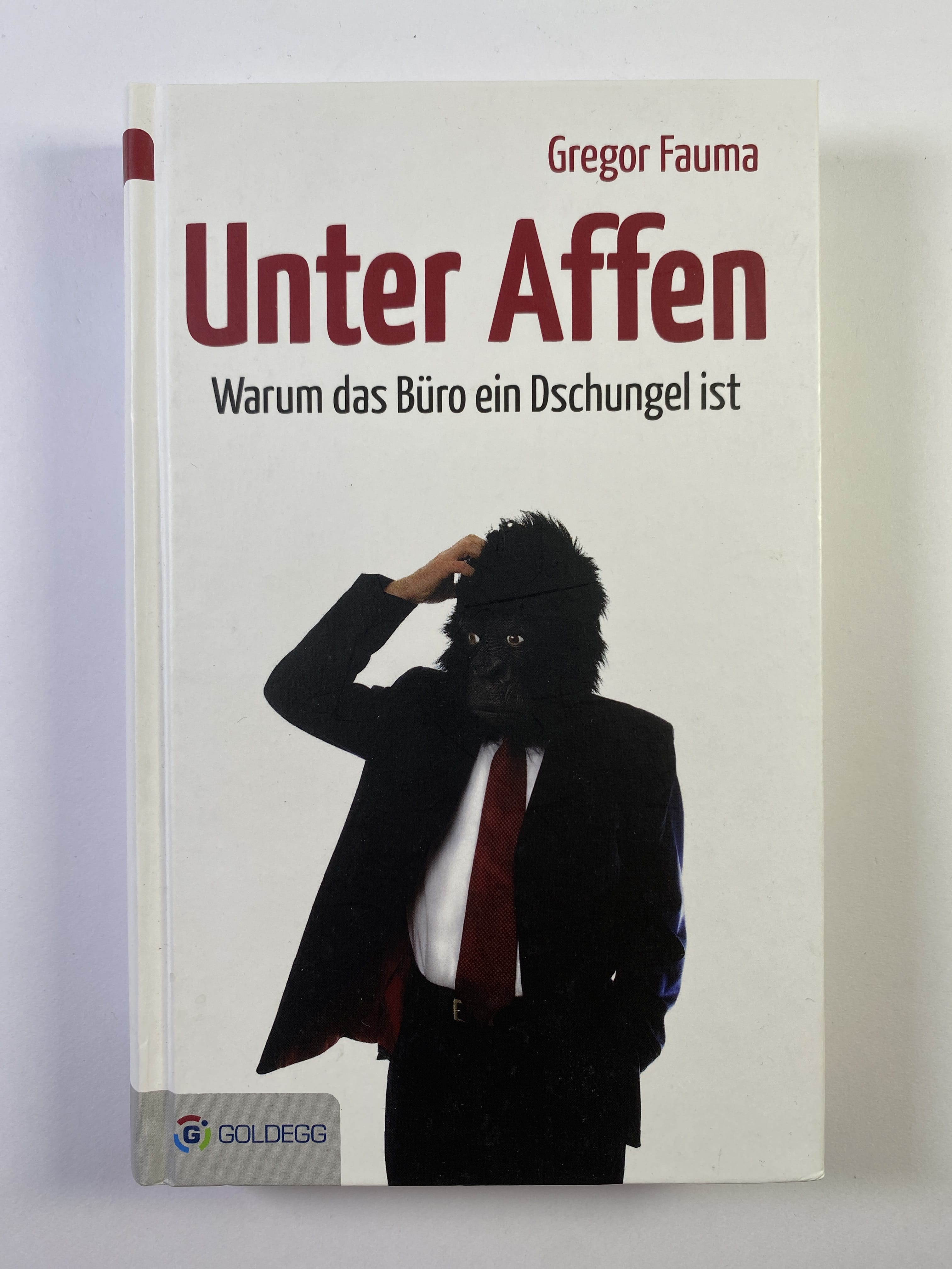 Levně Unter Affen: Warum das Büro ein Dschungel ist
