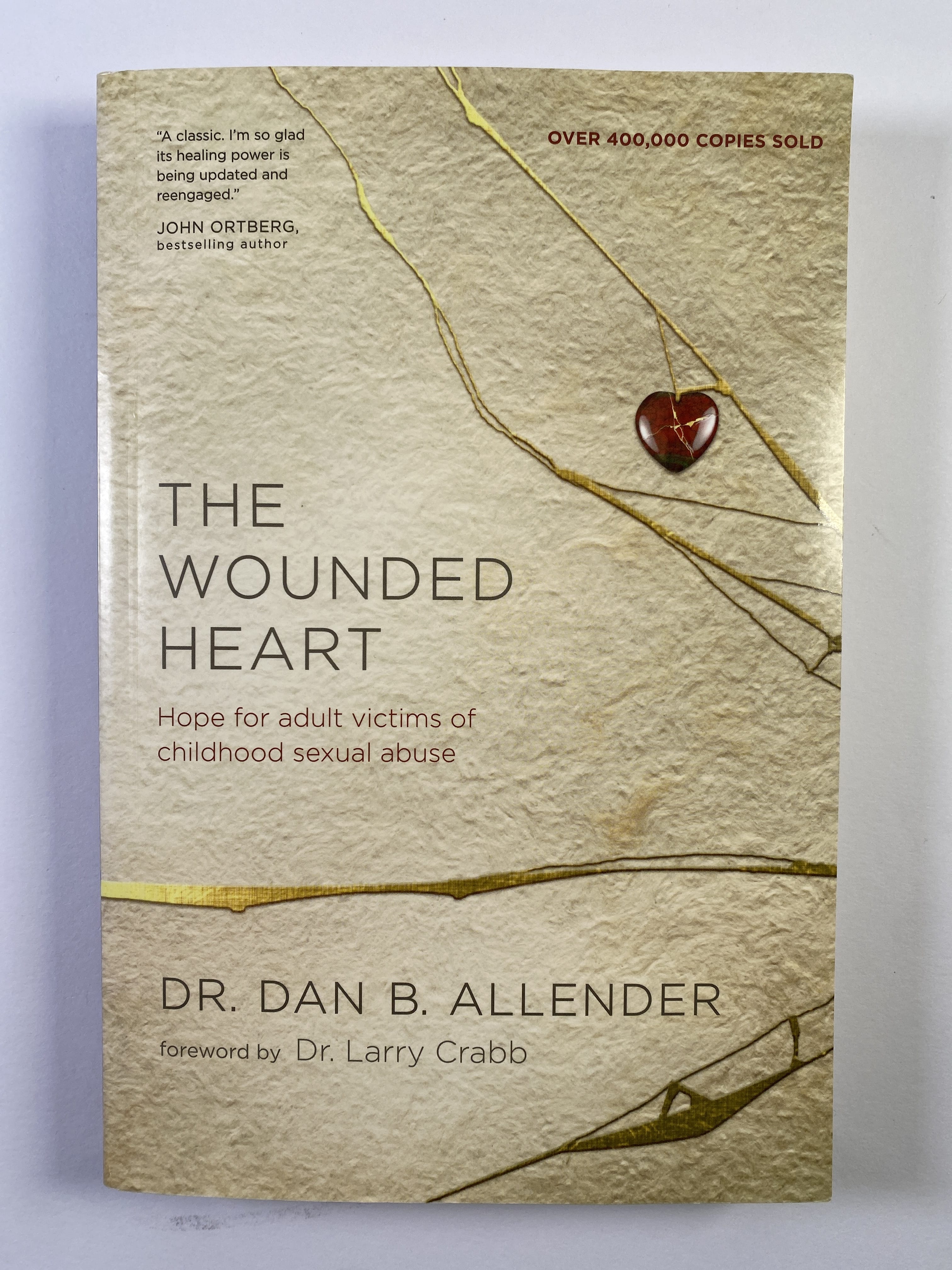 Levně The Wounded Heart